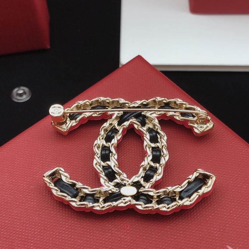 Ch**el brooches